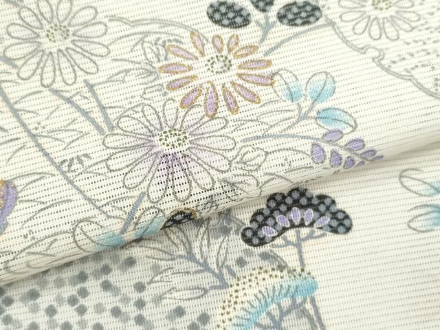 雪輪重ね流水草花文 金彩