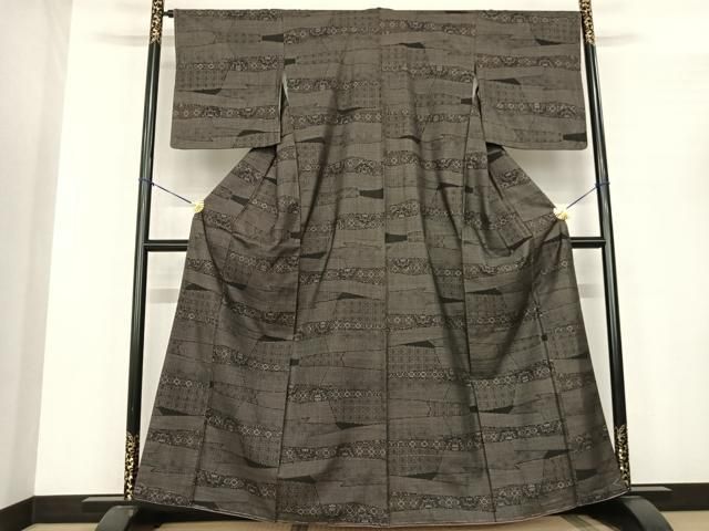 平和屋着物●本場大島紬 カタス7マルキ 吉祥花文 正絹 fy