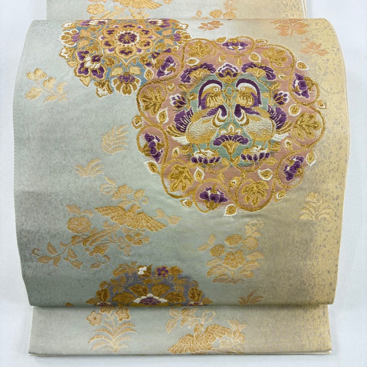 袋帯 名品 じゅらく 落款 帝王紫 華文 向かい鳥 箔 金糸 ベージュ