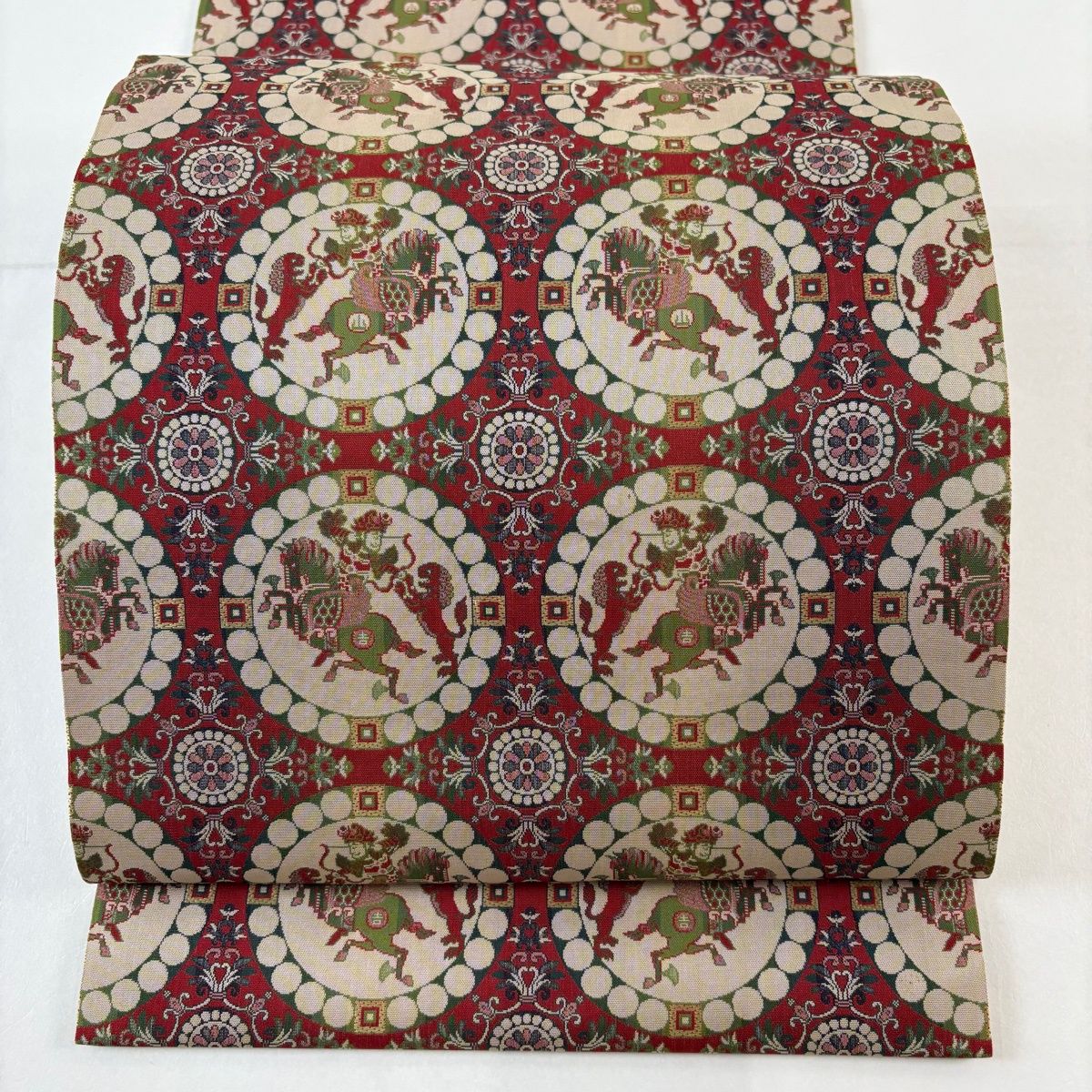 美品】 開き名古屋帯 名品 龍村美術織物 比翼仕立て 連珠文 狩猟文 赤