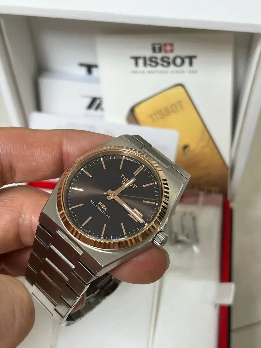 ティソ PRX 40 オートマティック ベゼル 18 K金