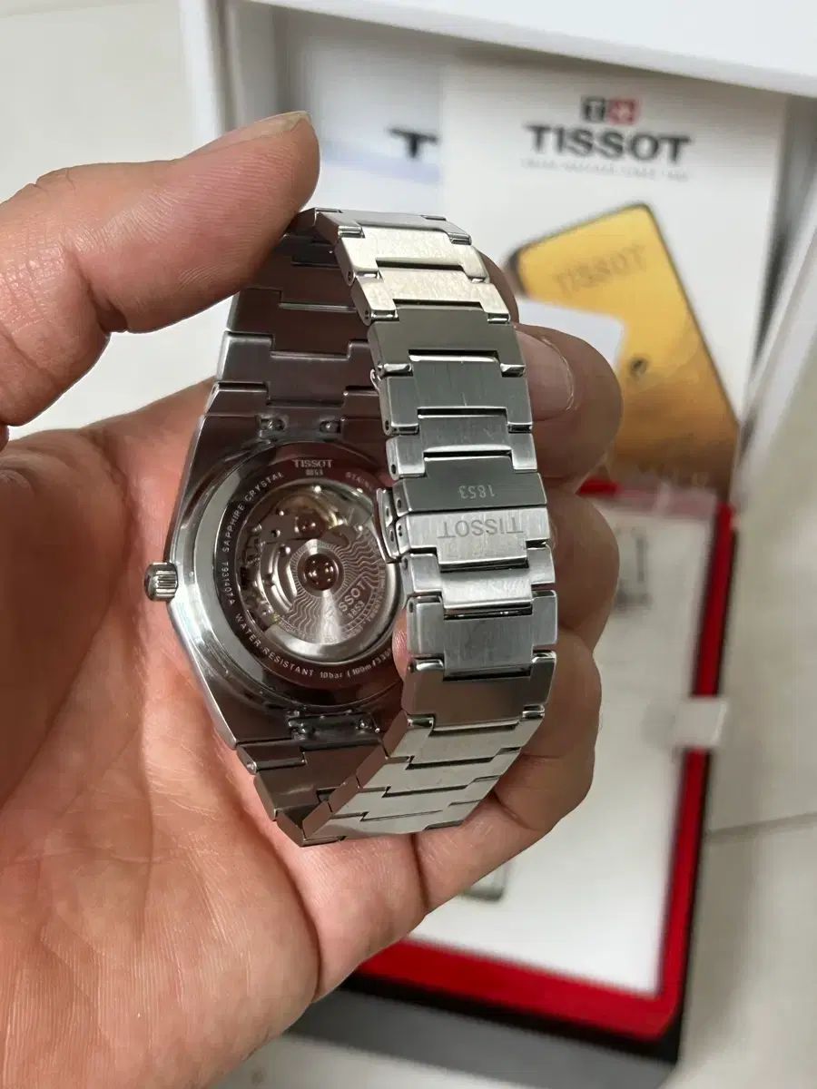 ティソ PRX 40 オートマティック ベゼル 18 K金