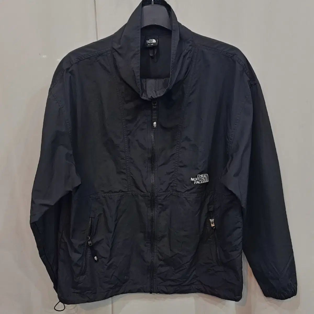 THE NORTH FACE ミドルロゴ ウィンドブレーカー ジャケット