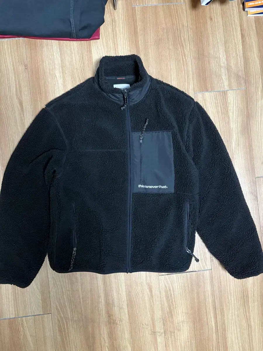 L ディスイズネバーザット フリース ブラック