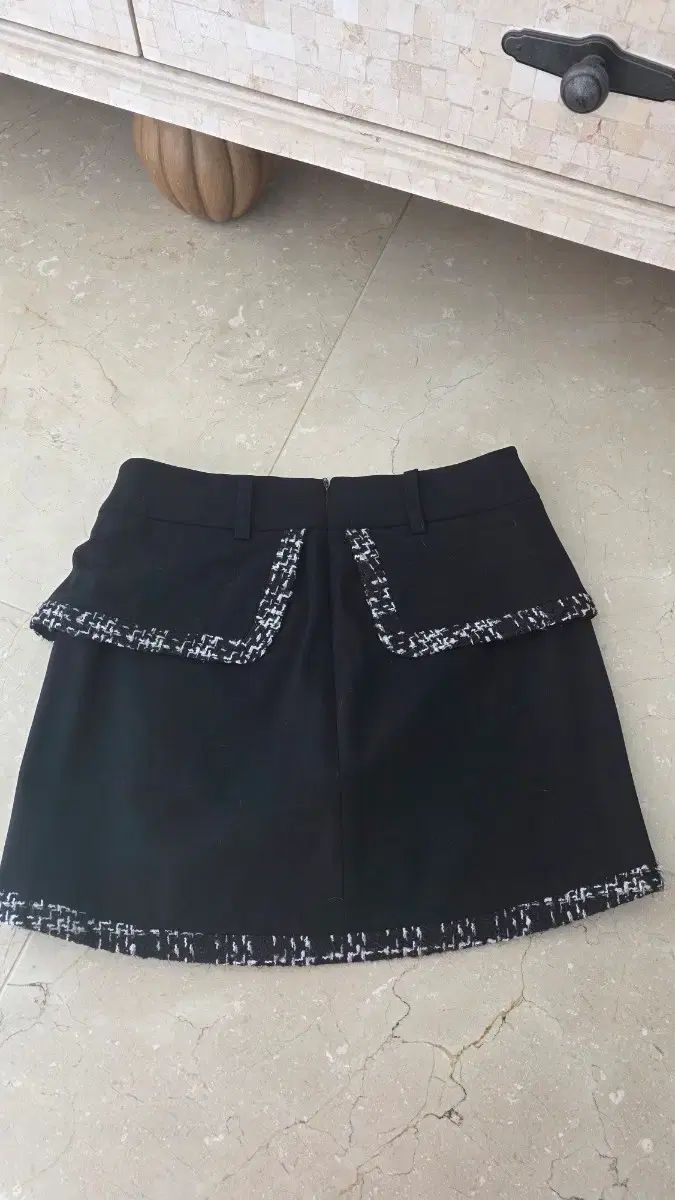 フェアライアー ゴルフウェア ミニスカートです。ブラック カラーに