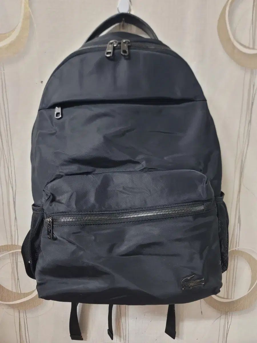 ラコステ ブラック バックパック ユニセックス バッグ