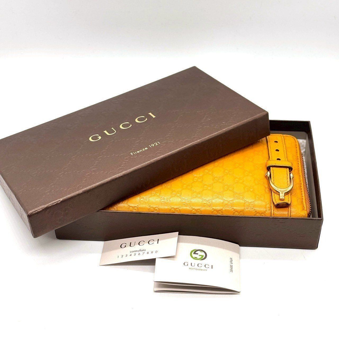 差し色は これくらいがいい GUCCI 長財布 グッチシマ ホースビット ラウンドジップ マイクロシマ 本革 付属品完備 イエロー