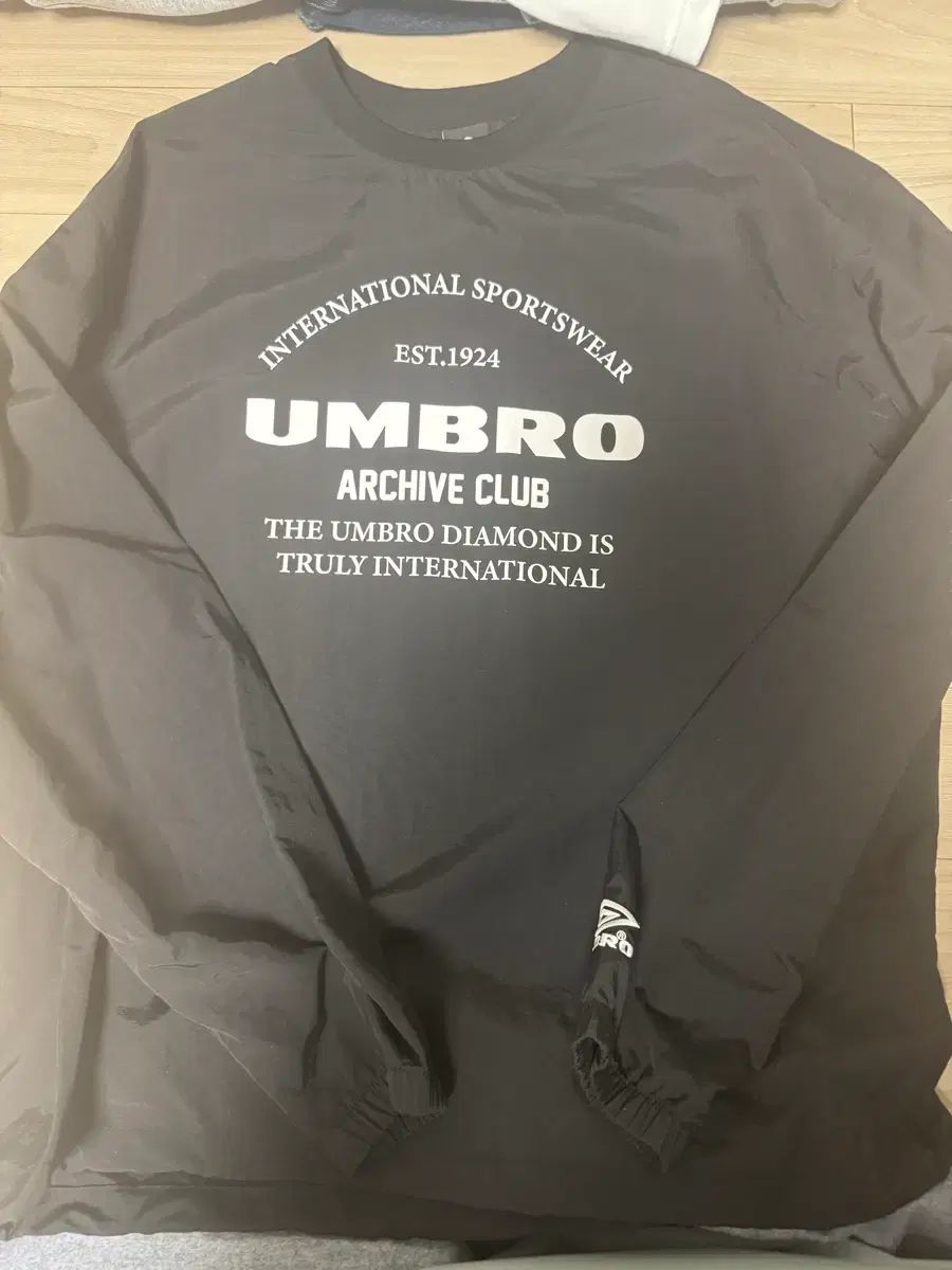 アンブロ ウィンドブレーカー 素材 スウェット ダウン スカート