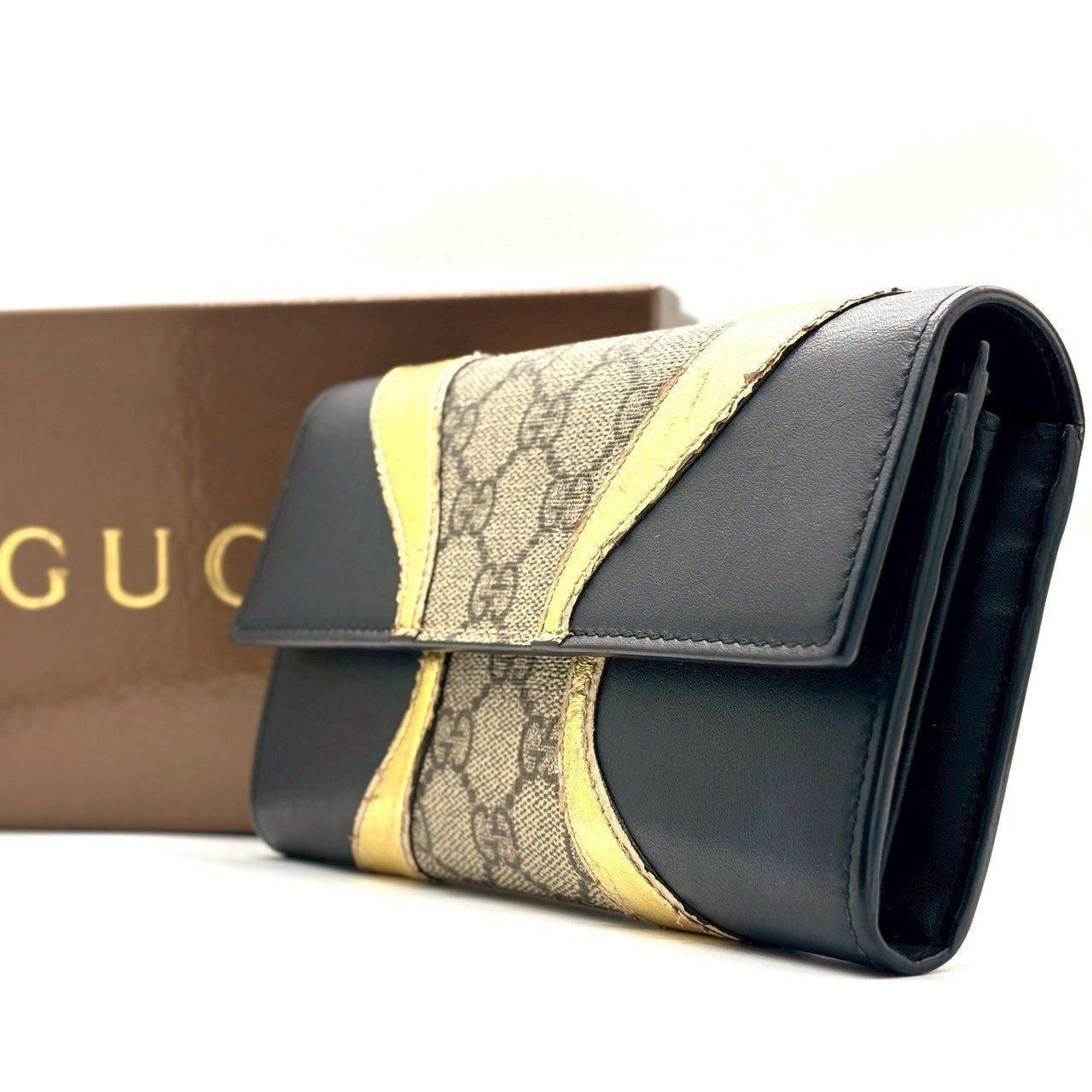 黒に、覚悟を。】 GUCCI 長財布 GGスプリーム フラップ PVC レザー GG