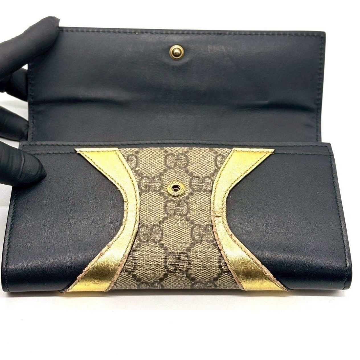 黒に、覚悟を。】 GUCCI 長財布 GGスプリーム フラップ PVC レザー GG