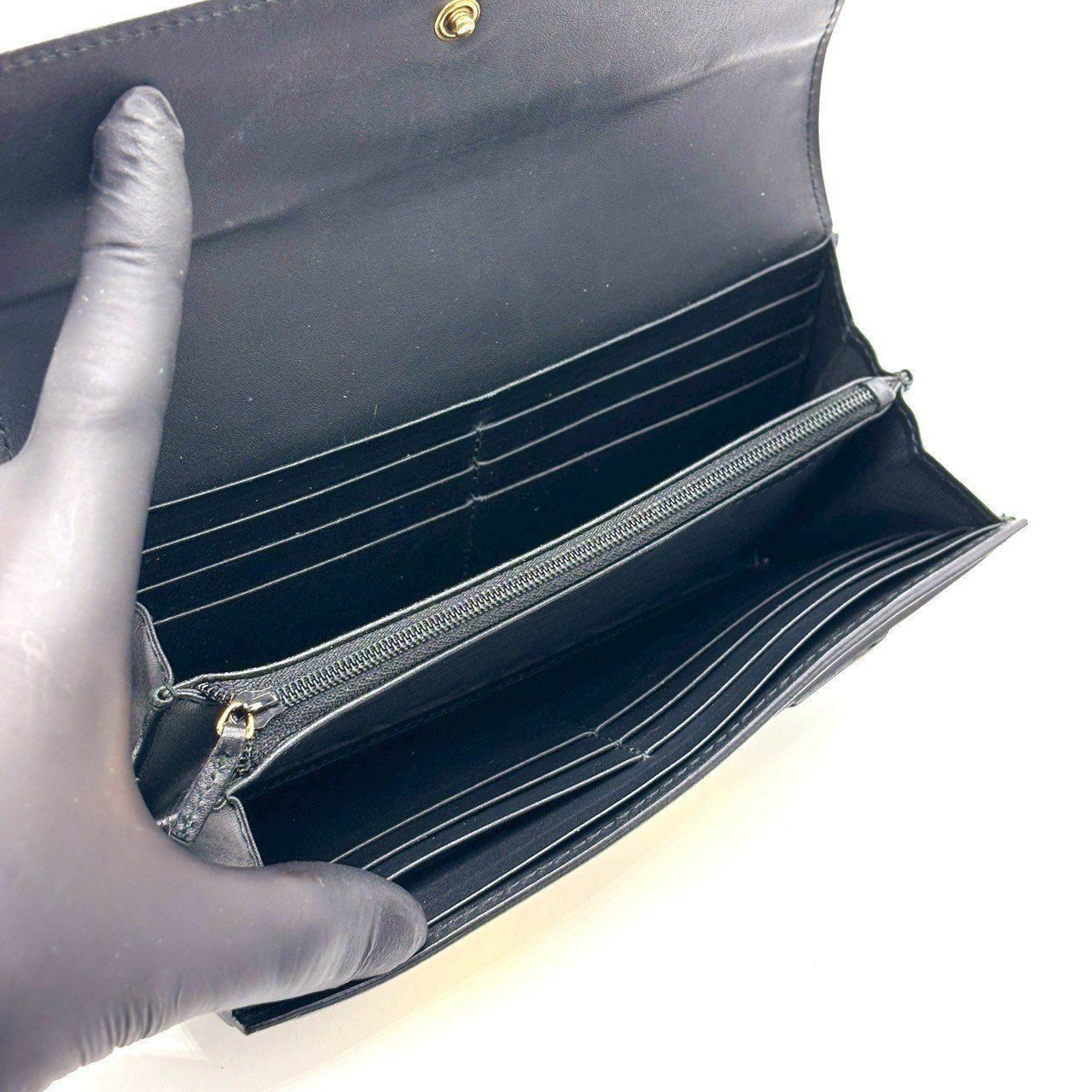 黒に、覚悟を。】 GUCCI 長財布 GGスプリーム フラップ PVC レザー GG