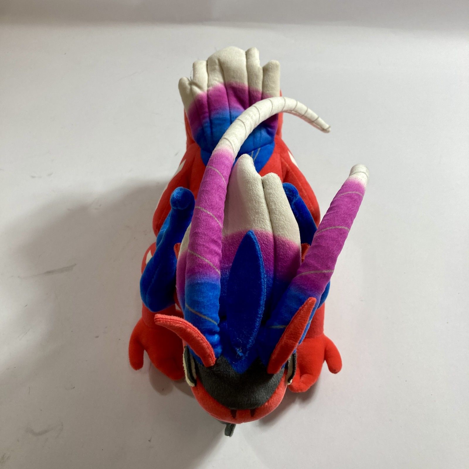 ポケモンセンター　コライドン　しっそうけいたい　　ぬいぐるみ Amazon.co.jp: ポケモンセンターオリジナル ぬいぐるみ コライドン