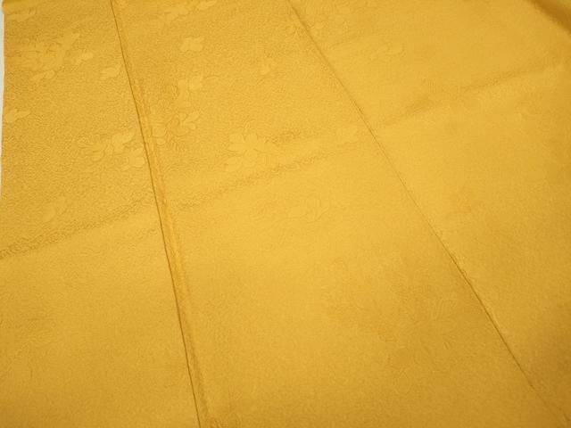 平和屋着物○上質な色無地 楽凛 舞花地紋 柑子色 三越扱い 反端付き