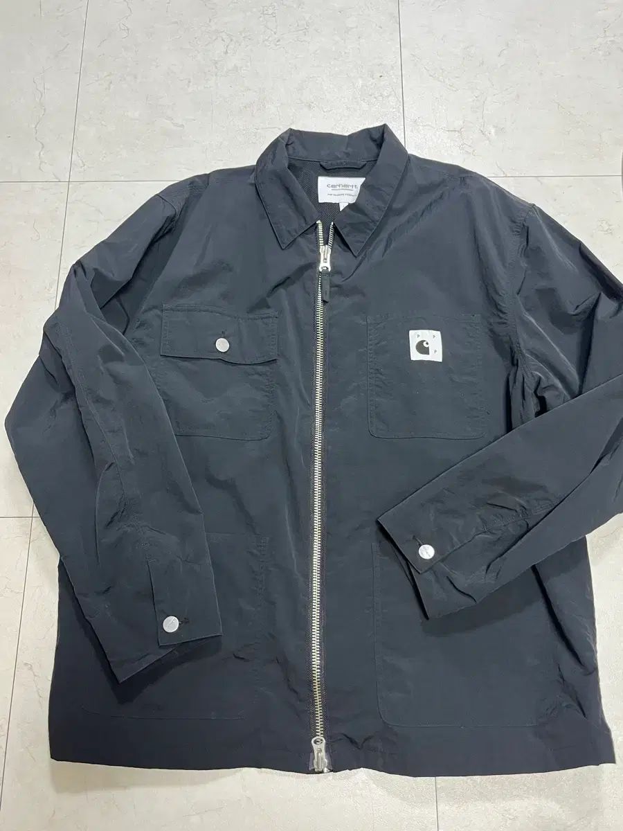 カーハート WIP x ポップトレーディングカンパニー L