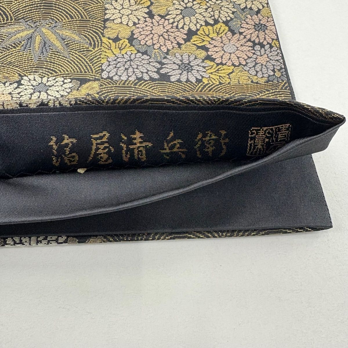 美品】 袋帯 名品 箔屋清兵衛 落款 草木染 市松小花文 箔 唐織 茶緑色