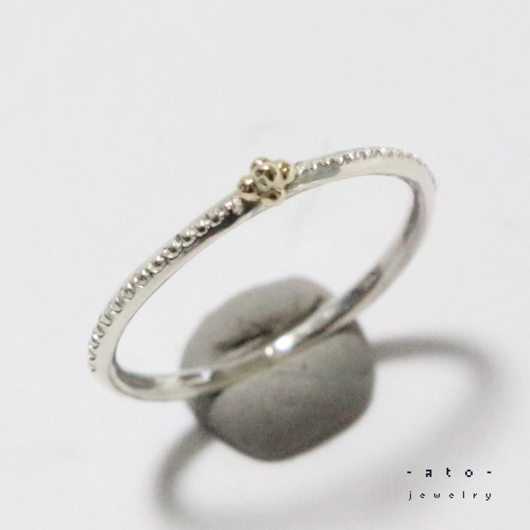 ちいさなK10の粒々とミル打ちシルバーのコンビリング約11号弱 - メルカリ