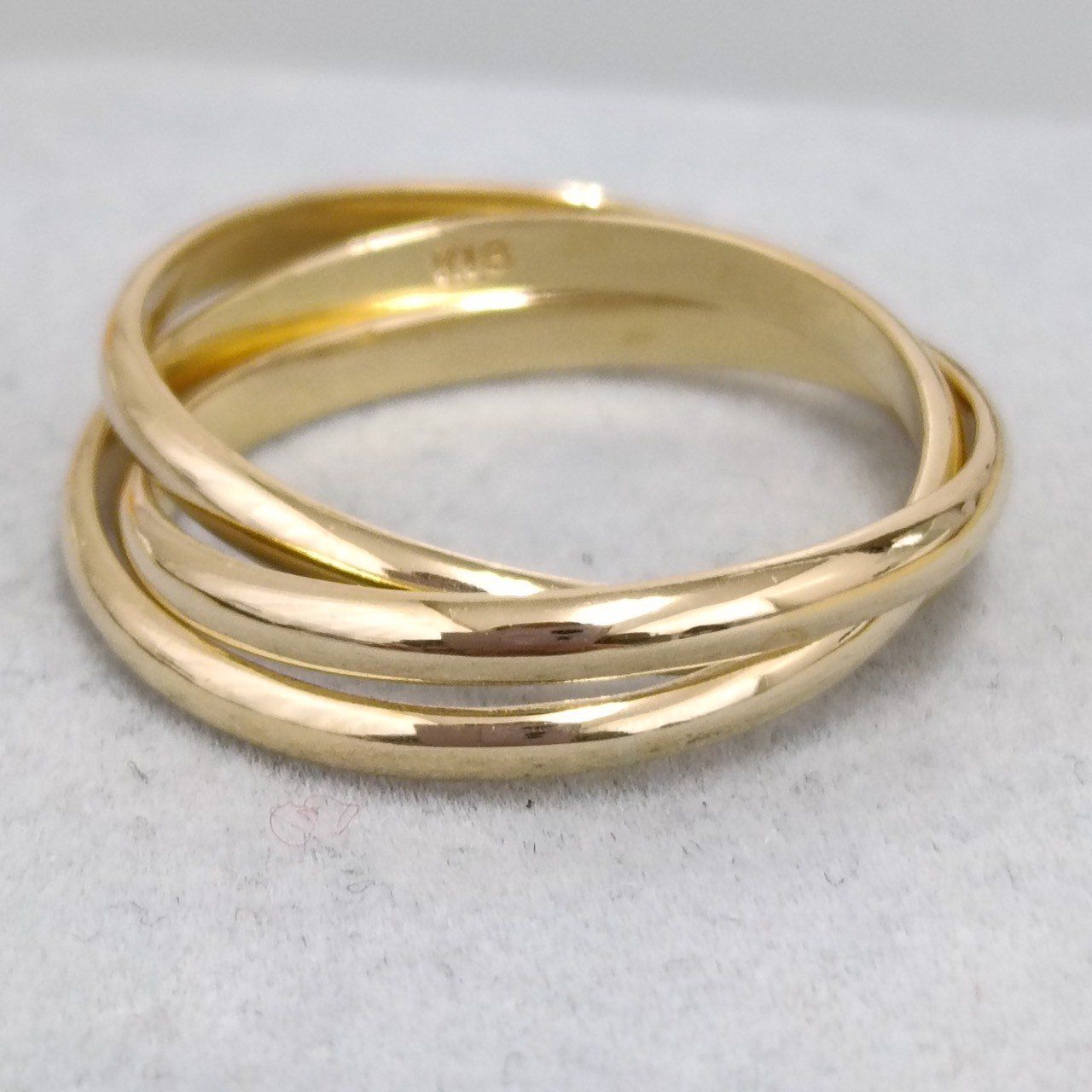 18金 K 18 男女兼用 トリニティリング 3.69ｇ 11号 E 62