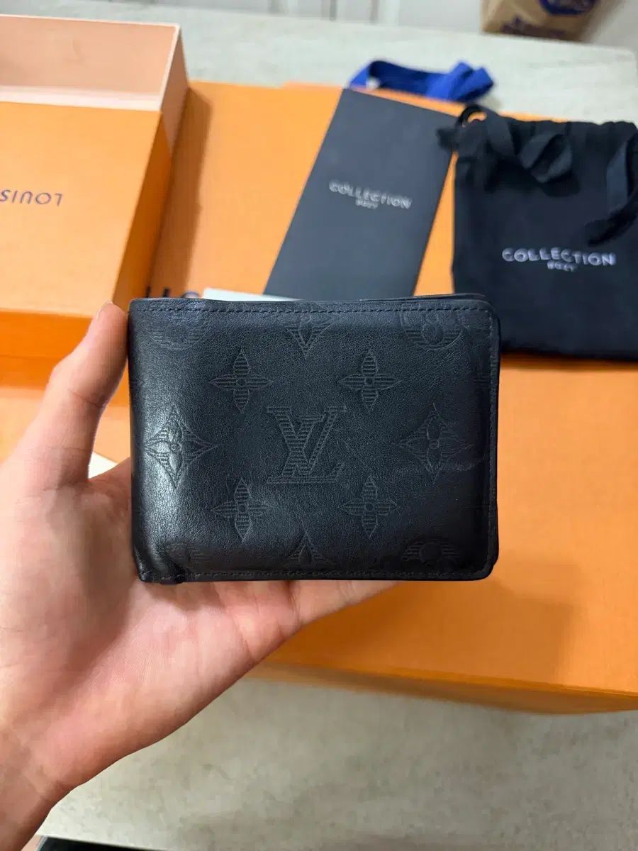 ルイヴィトン シャドウ ブラック 二つ折り財布