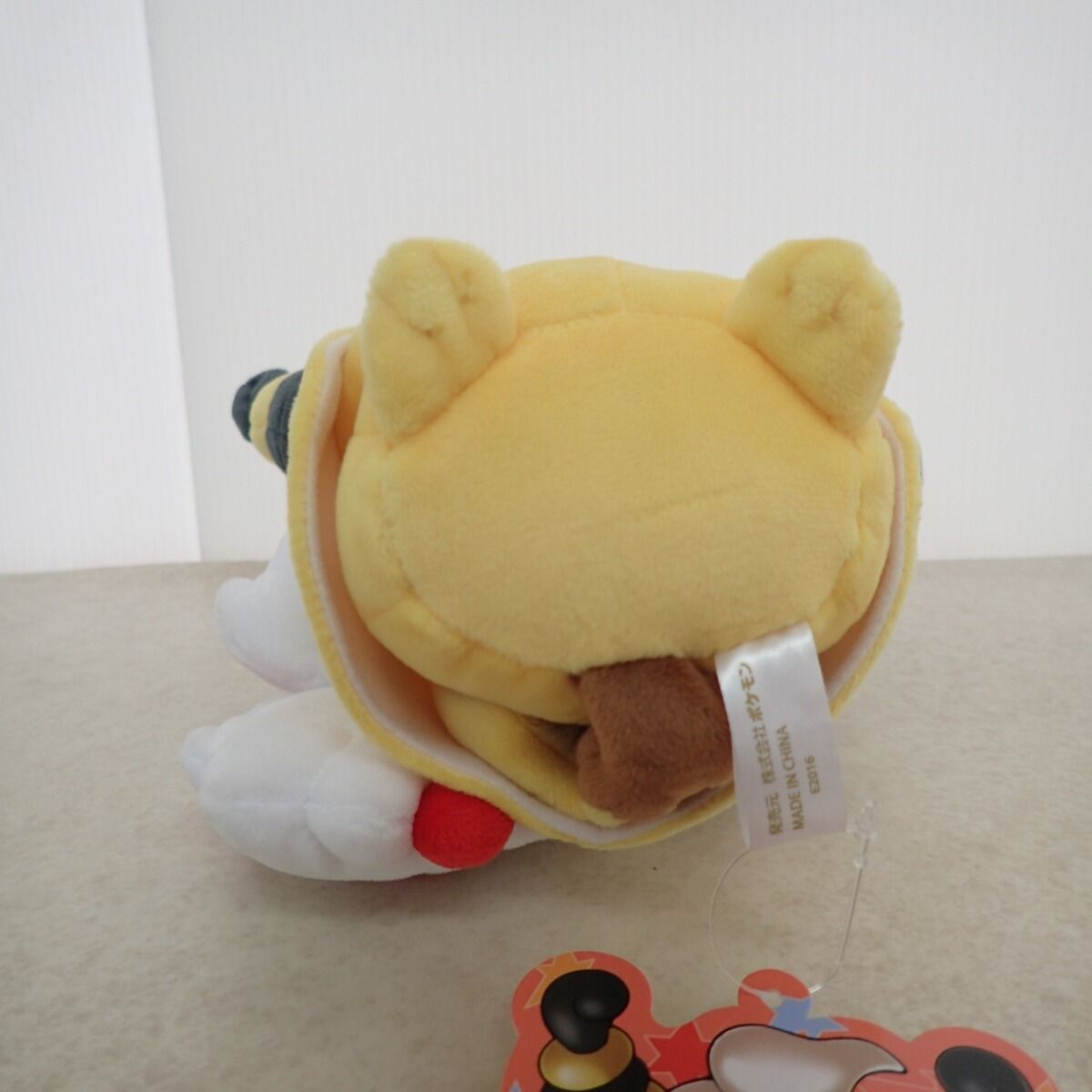 ポケモンセンター ぬいぐるみ メガデンリュウのポンチョを着た