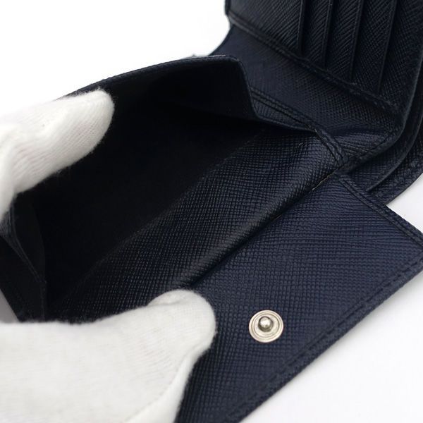 PRADA / プラダ ◇型押しロゴ サフィアーノレザー 二つ折り財布