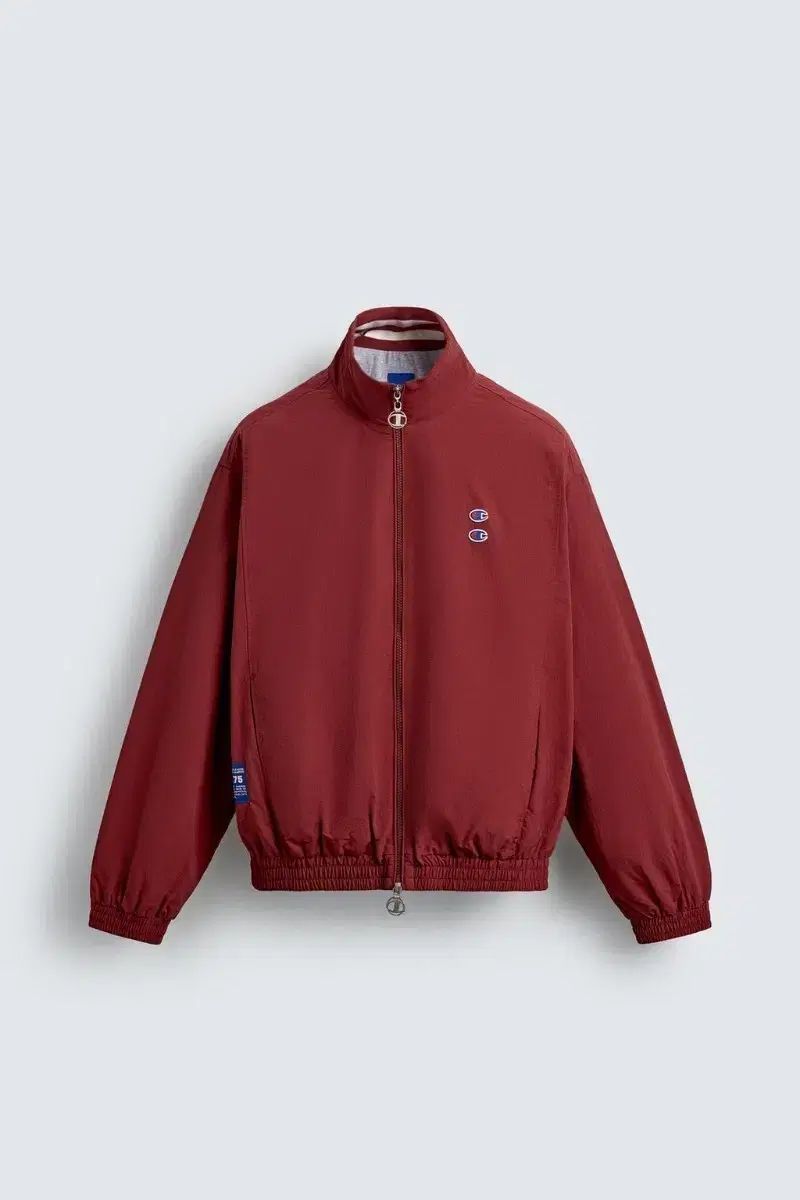 L ZARA ザラ x Champion チャンピオン テクニカル パッチ ジャケット レッド