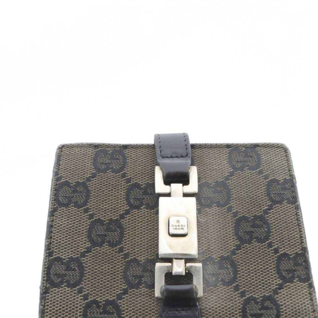 グッチ GUCCI ジャッキー 二つ折り財布 ロゴ 茶色 ブラウン 黒 - メルカリ