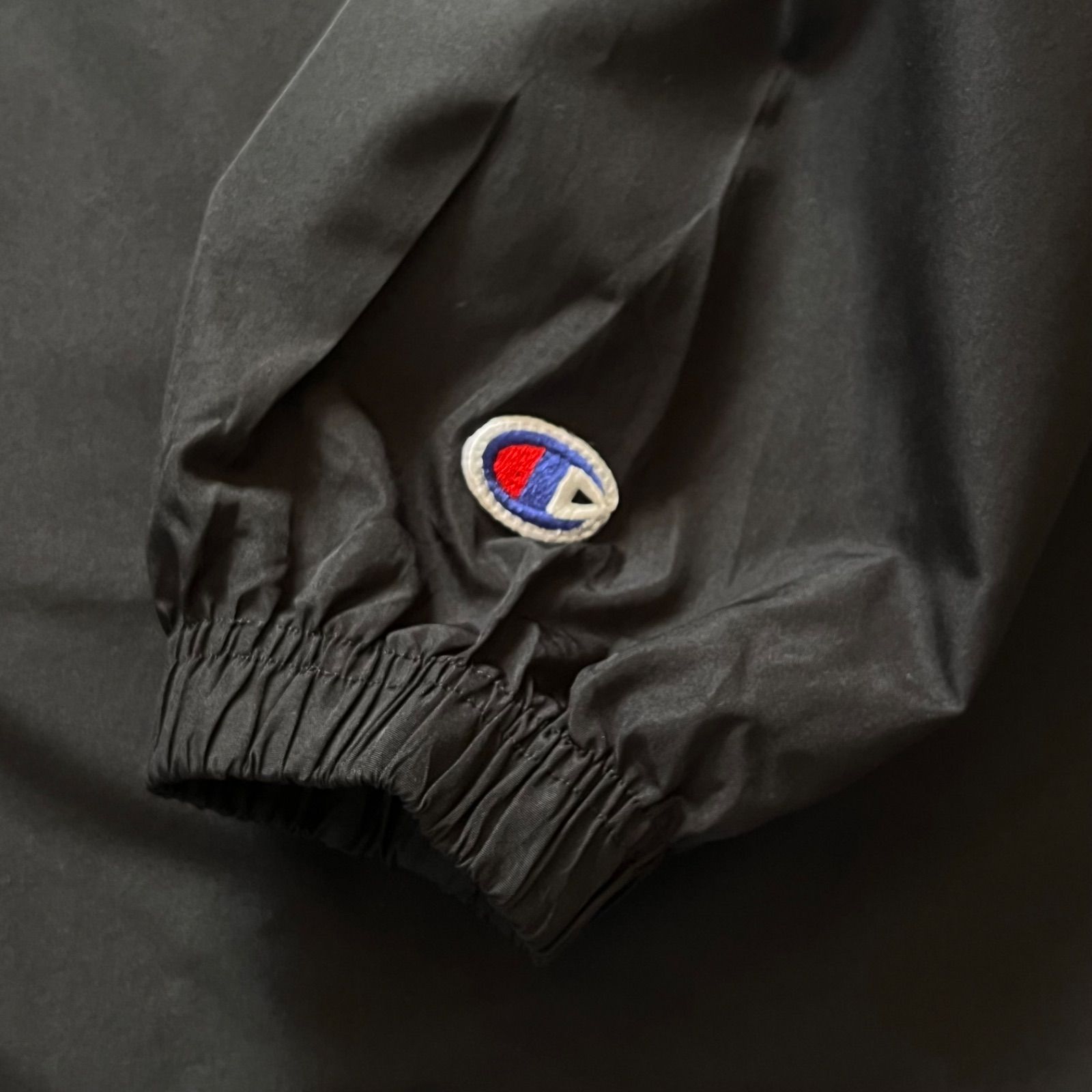 Champion チャンピオン ロゴワッペン プリント ハーフジップ フード 