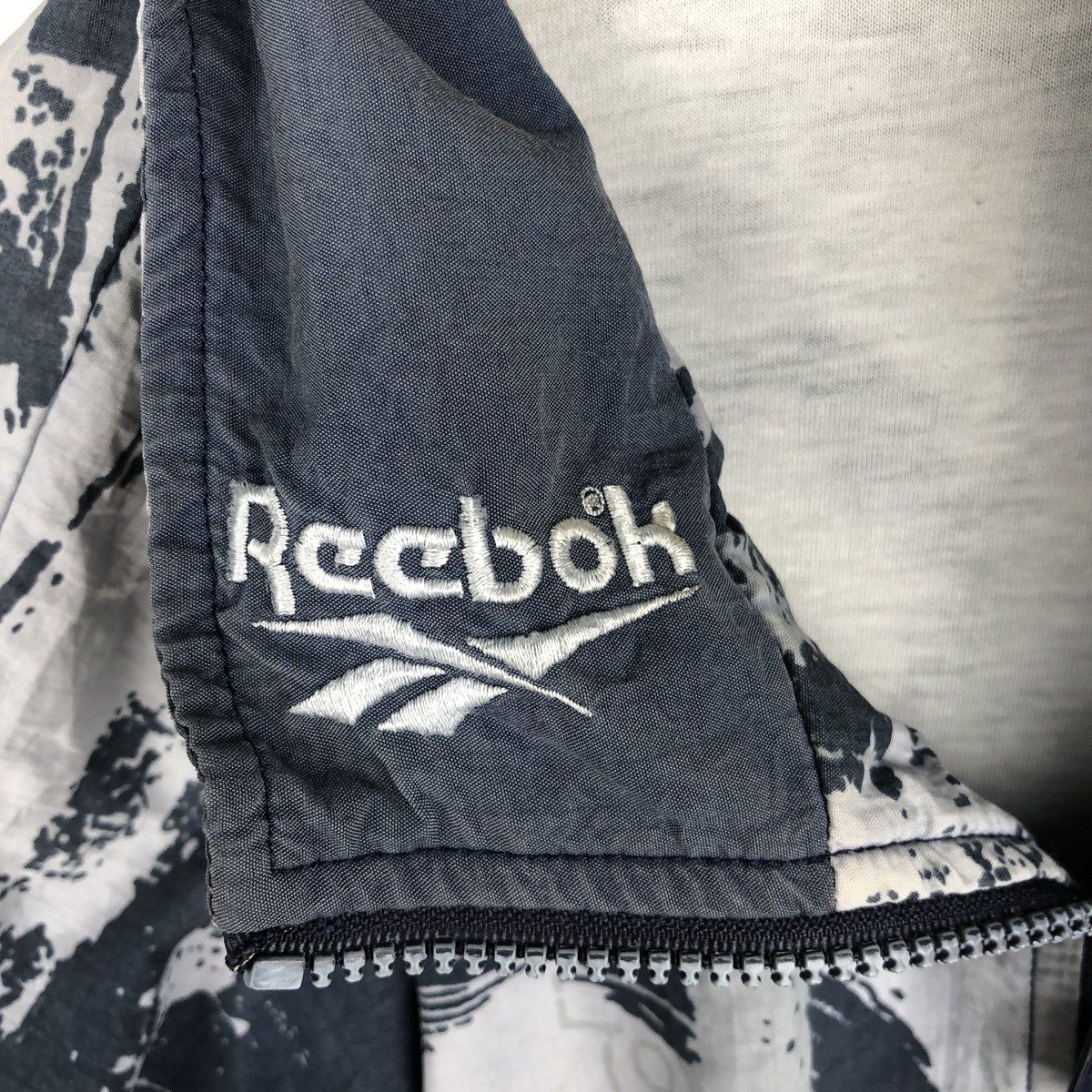 メンズ 古着 90年代 リーボック Reebok 総柄 ウインドブレーカー