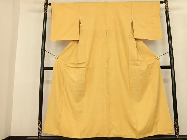 平和屋着物○本場結城紬 重要無形文化財 色無地 玉蜀黍色 正絹 逸品