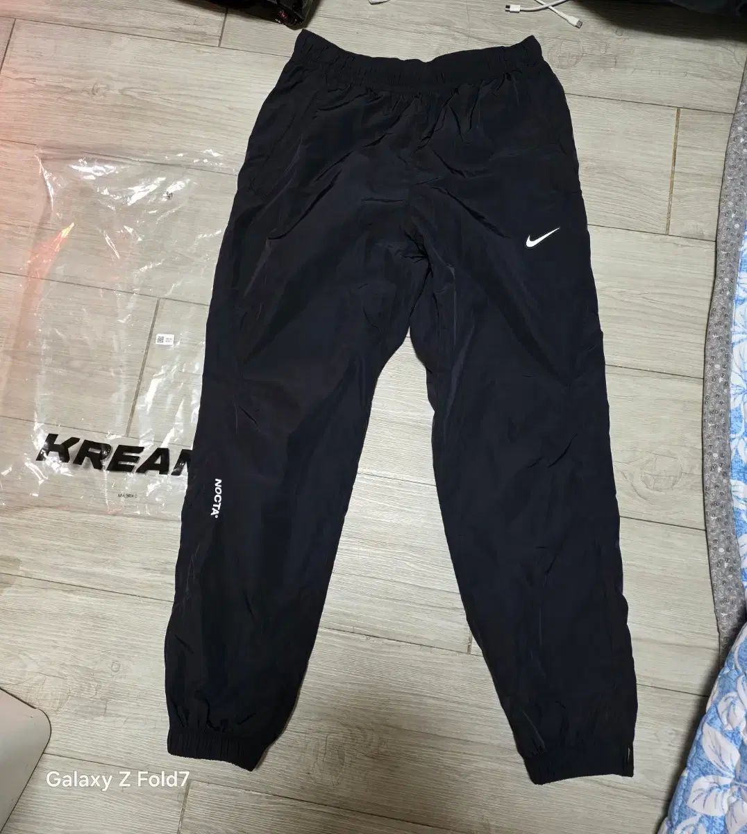 ナイキ x ドレイク ノクタ ウーブン トラック パンツ