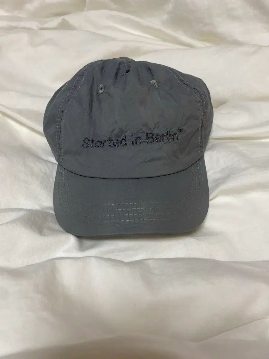 オプティミスティック ランナーズ 帽子