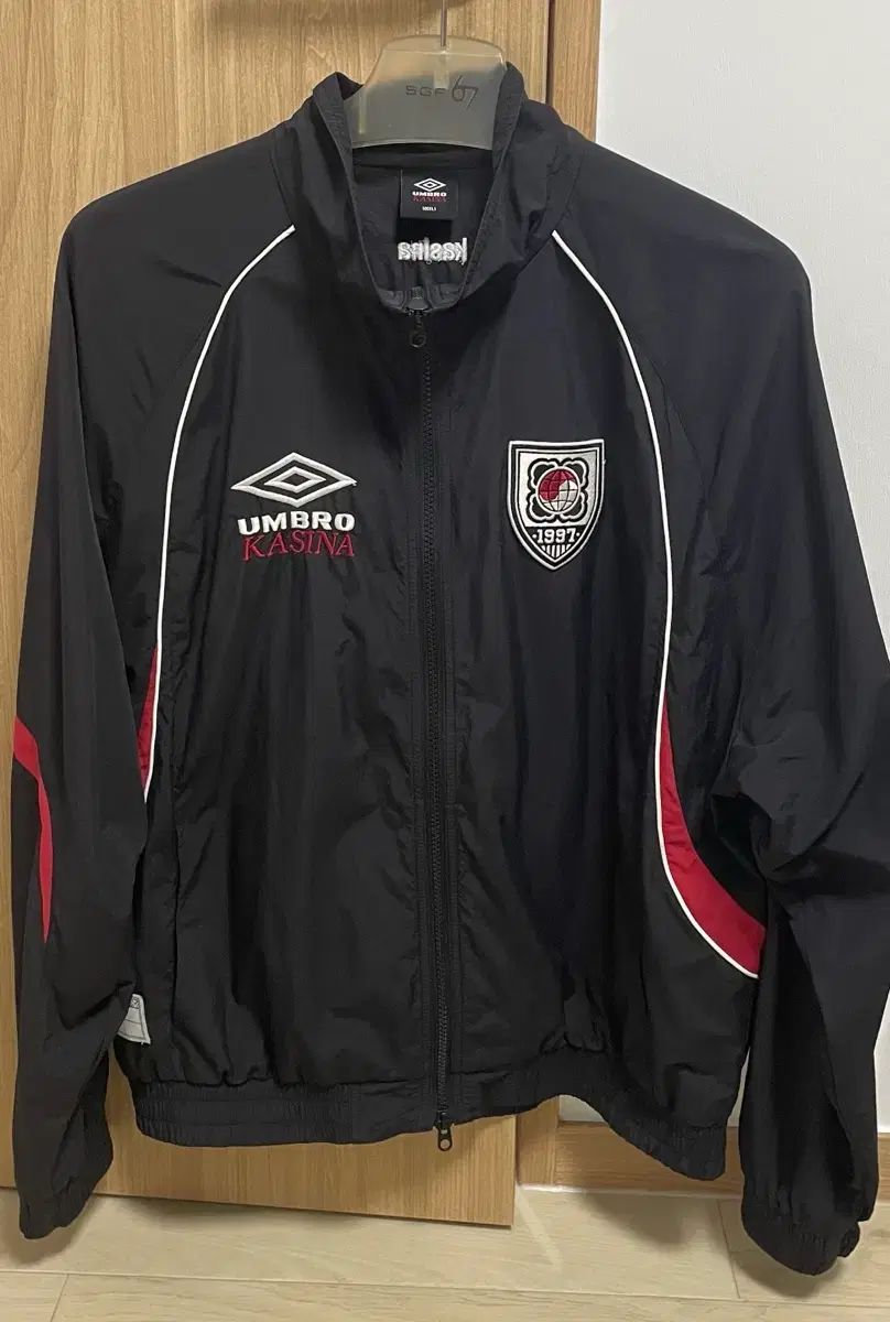 アンブロ カシナ スタンネック ジャケット 100 L