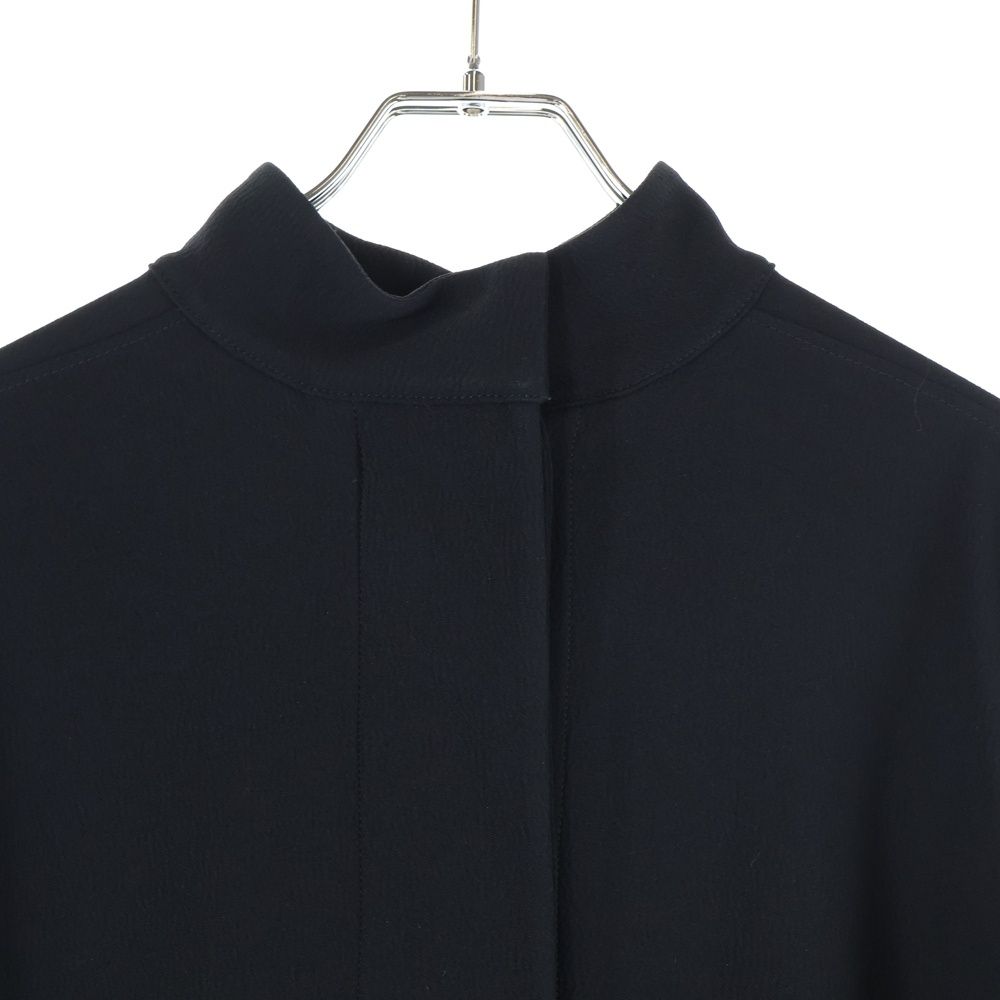 バックボタンフライ