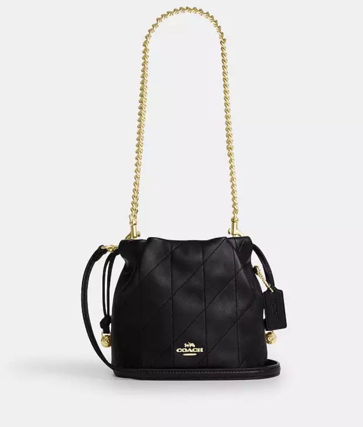 コーチ フェイ ミニ ドローストリング バッグ キルティング