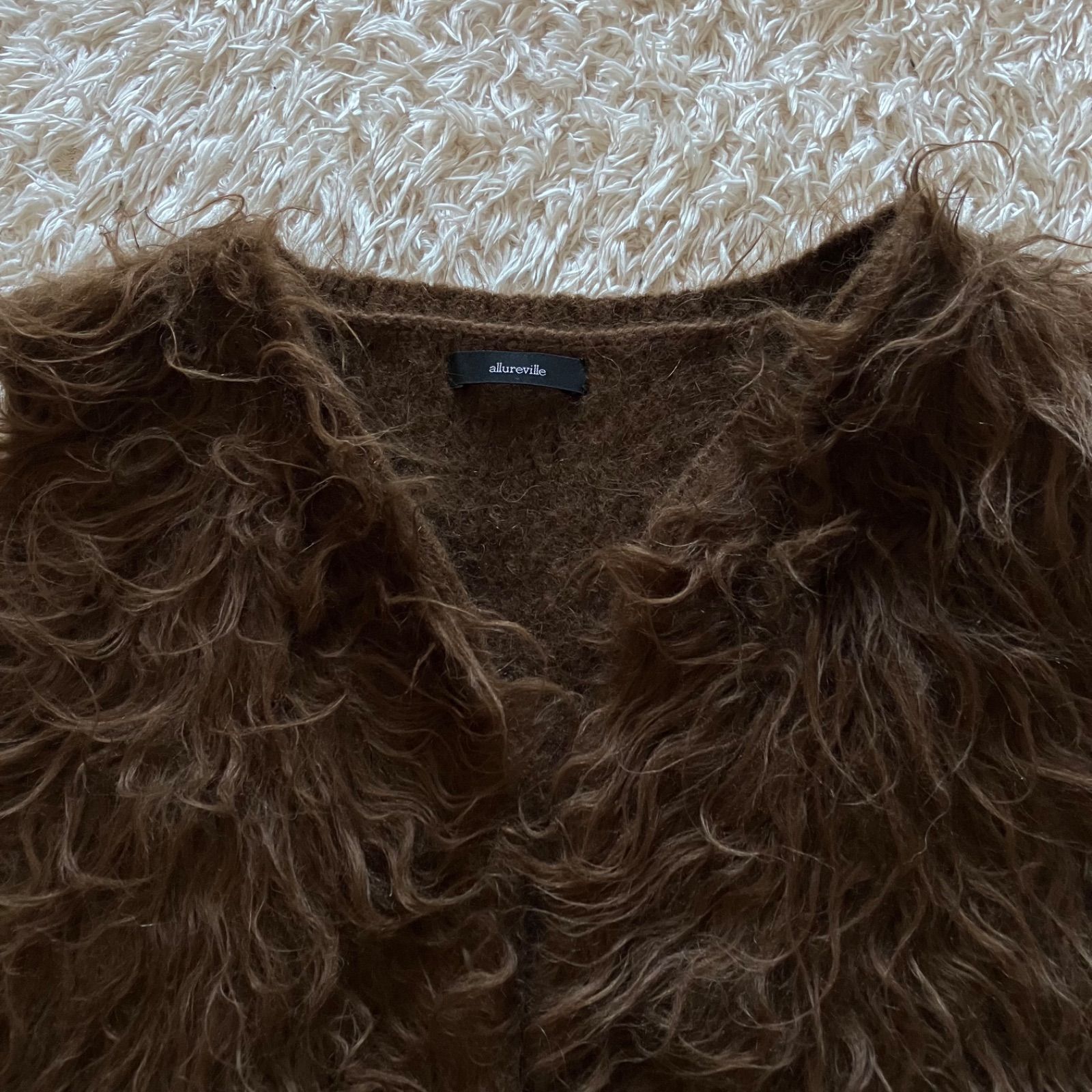 アルアバイル　フード付きファーベスト allureville（アルアバイル）の「フェイクファーフーディジレ（ベスト