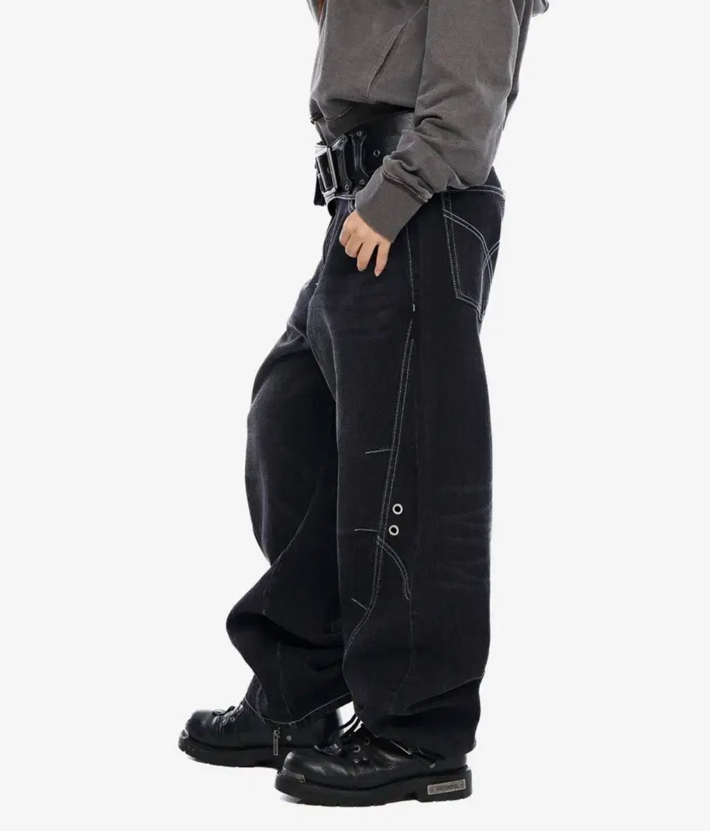 アッカム ズボン Incision Eyelet Washed Denim Pants