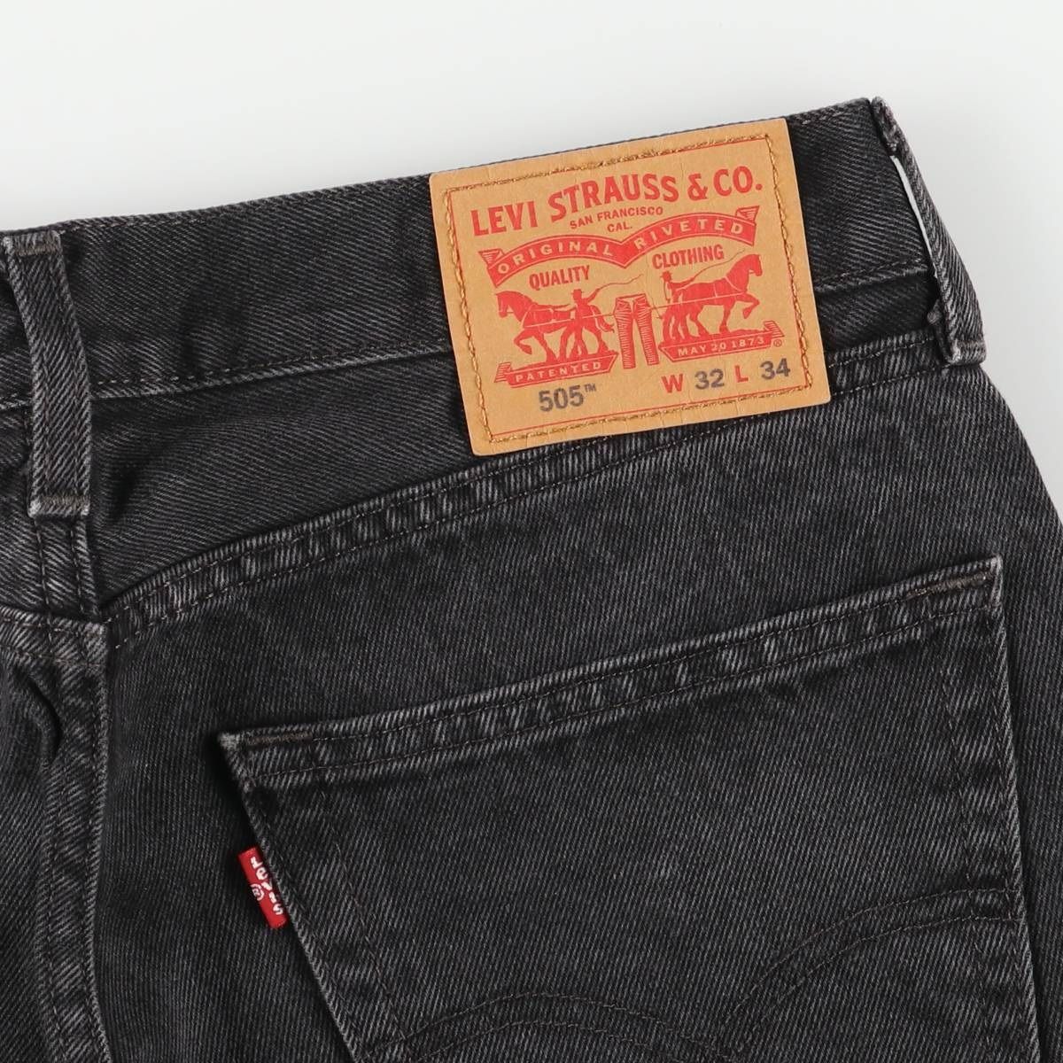 テーパードデニムパンツ