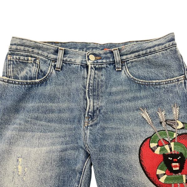 ○ グッチ GUCCI ジーンズ デニム エンブロイダリー ハートを貫く蛇