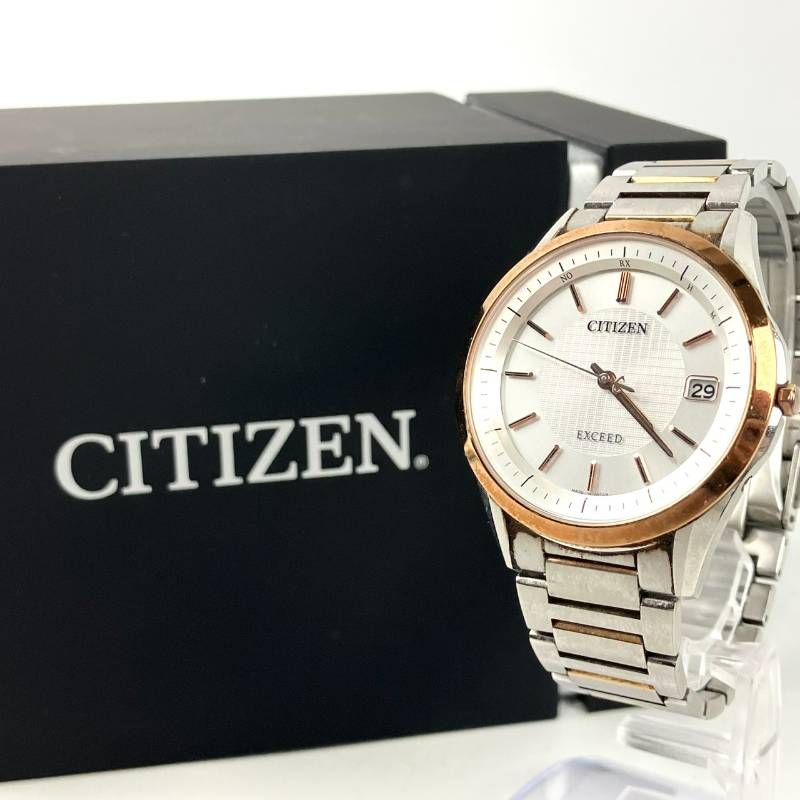 稼働品 CITIZEN シチズン 腕時計 エコドライブ ソーラー 電波時計 EXCEED エクシード アナログ デイト 白文字盤 3針 金属ベルト シルバー き W 63