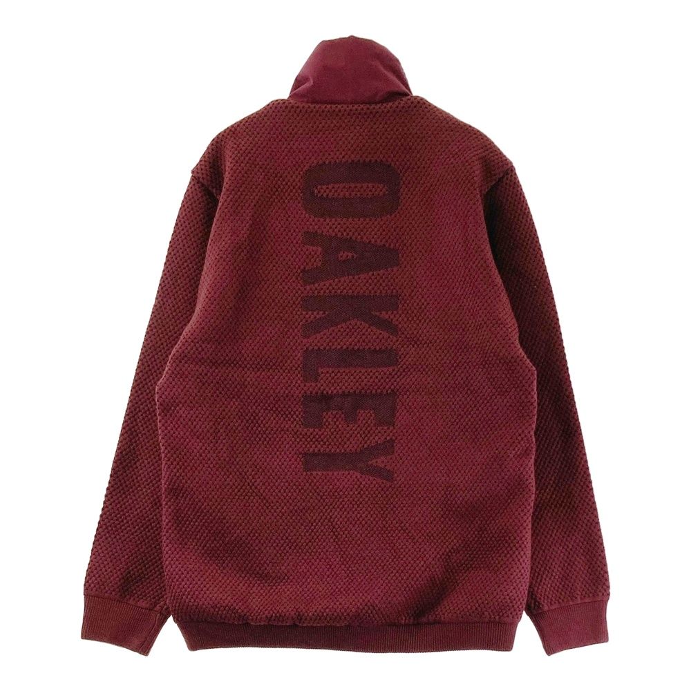 サイズ：L OAKLEY オークリー FOA404252 ニット切替 蓄熱 ジップジャケット  レッド系 [240101605058] ゴルフウェア メンズ ストスト サイズ：L OAKLEY オークリー FOA404252 ニット切替 蓄熱 ジップ