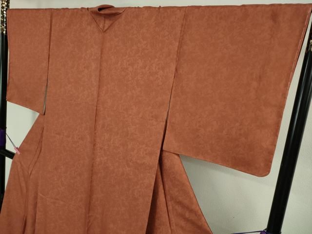 平和屋本店○極上 紋屋井関 御寮織 色無地 お召地 鳳凰笹地紋 肉桂色