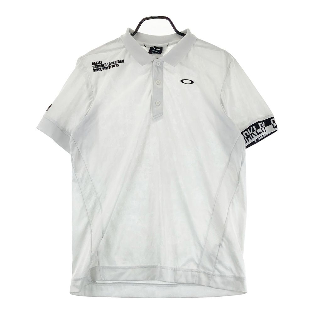 サイズ：XL OAKLEY オークリー 半袖ポロシャツ スカル 総柄 ホワイト系