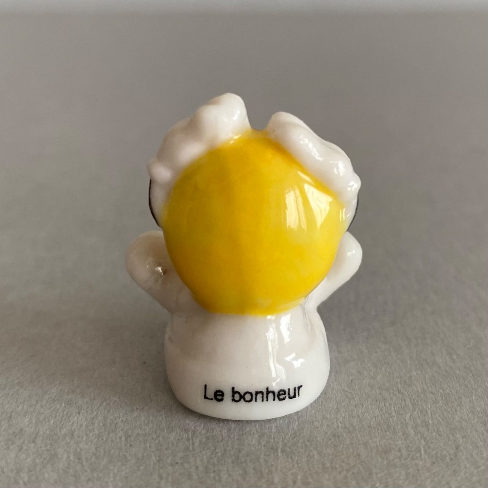 おちゃめなスマイリーのフェーブ／フランス雑貨／陶器ミニチュア