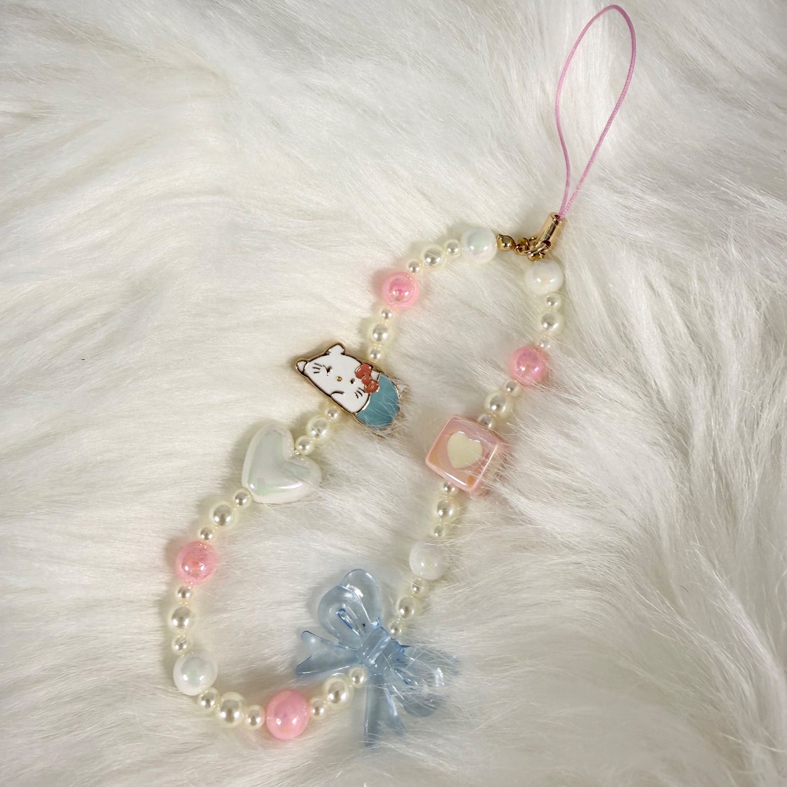 新品 ハローキティ パールビーズ携帯ストラップ - メルカリ