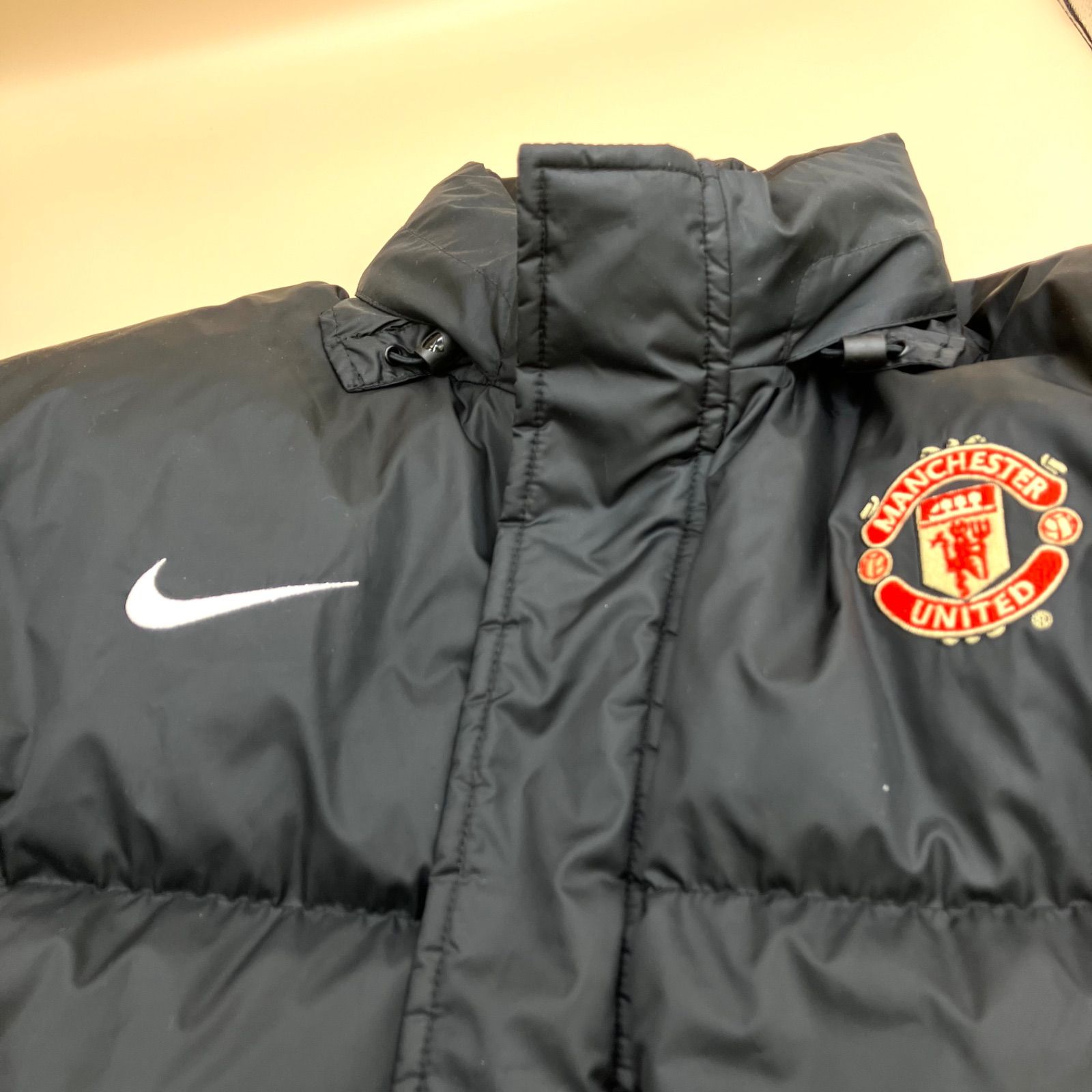 SG4069 NiKE マンチェスターユナイテッド ダウンジャケット - メルカリ