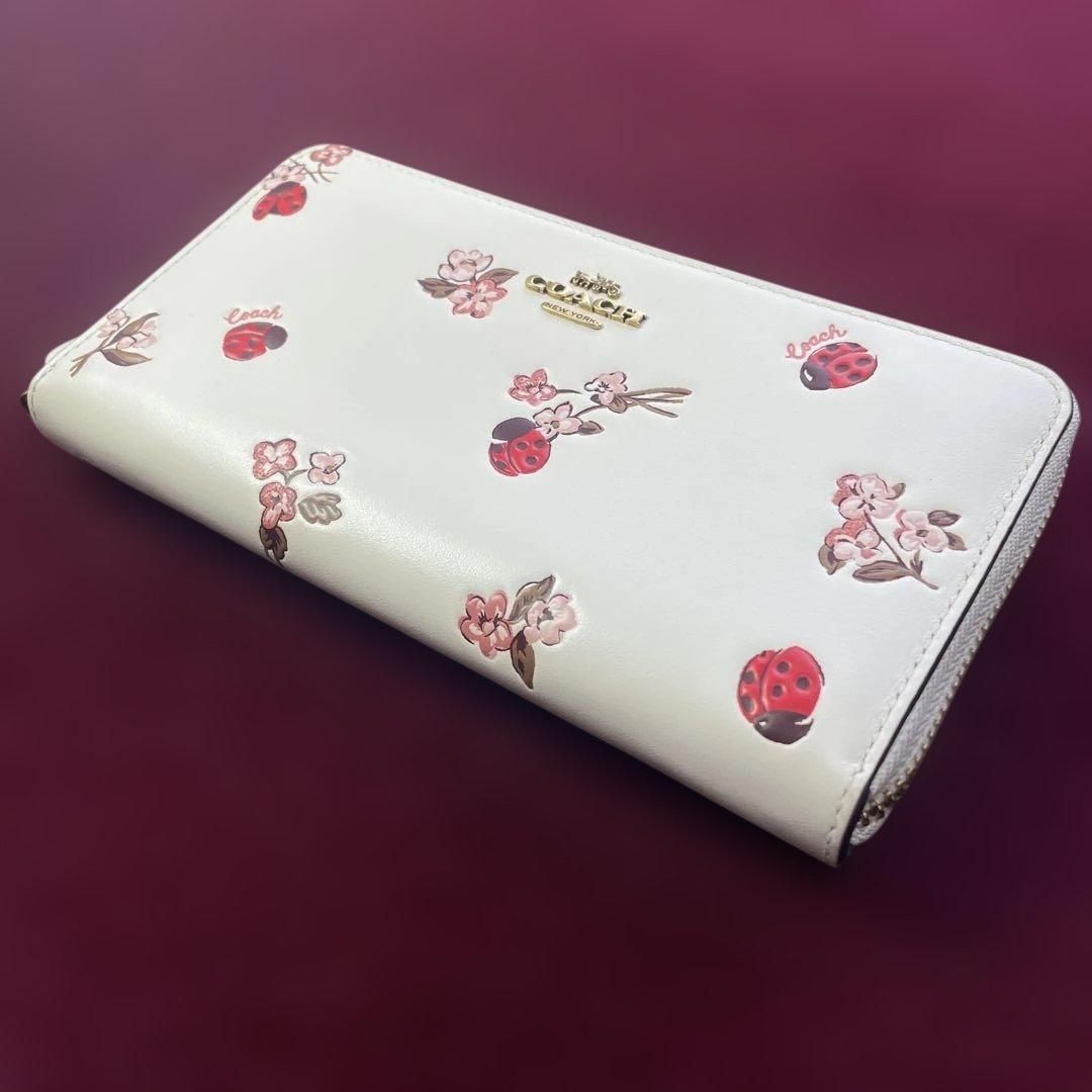 極美品】 COACH コーチ 花柄 てんとう虫 長財布 ラウンドファスナー 美 