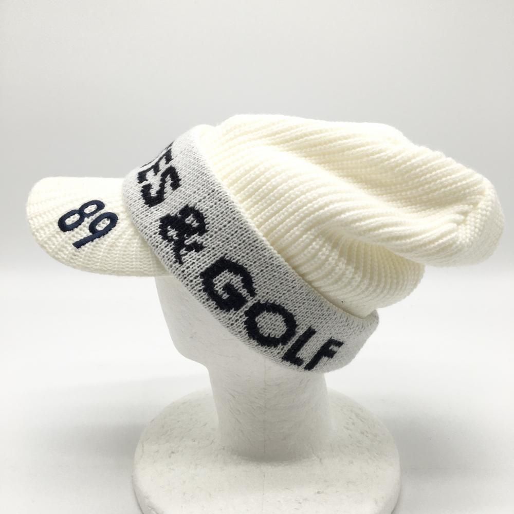 【新品未使用】パーリーゲイツ　つば付き　ニット帽子　総柄　落書きシリーズ パーリーゲイツ つば付ニット帽 白×黒 裏フリース アクリル100％ FR