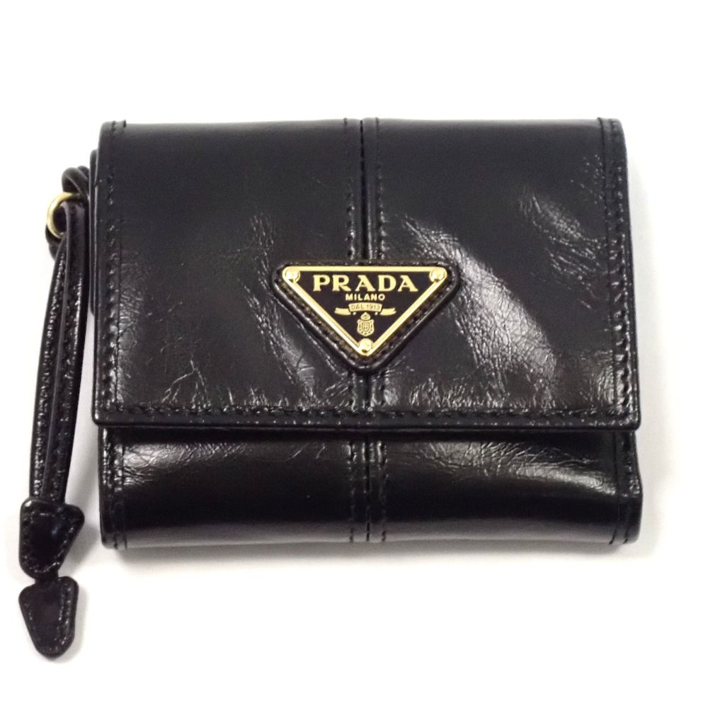 プラダ コンパクト財布 ソフトルックスレザー 財布 1MH043 ブラック×ゴールド金具 PRADA 未使用 Th1005321 未使用 Th1005321 プラダ コンパクト財布 ソフトルックスレザー 財布 1MH043