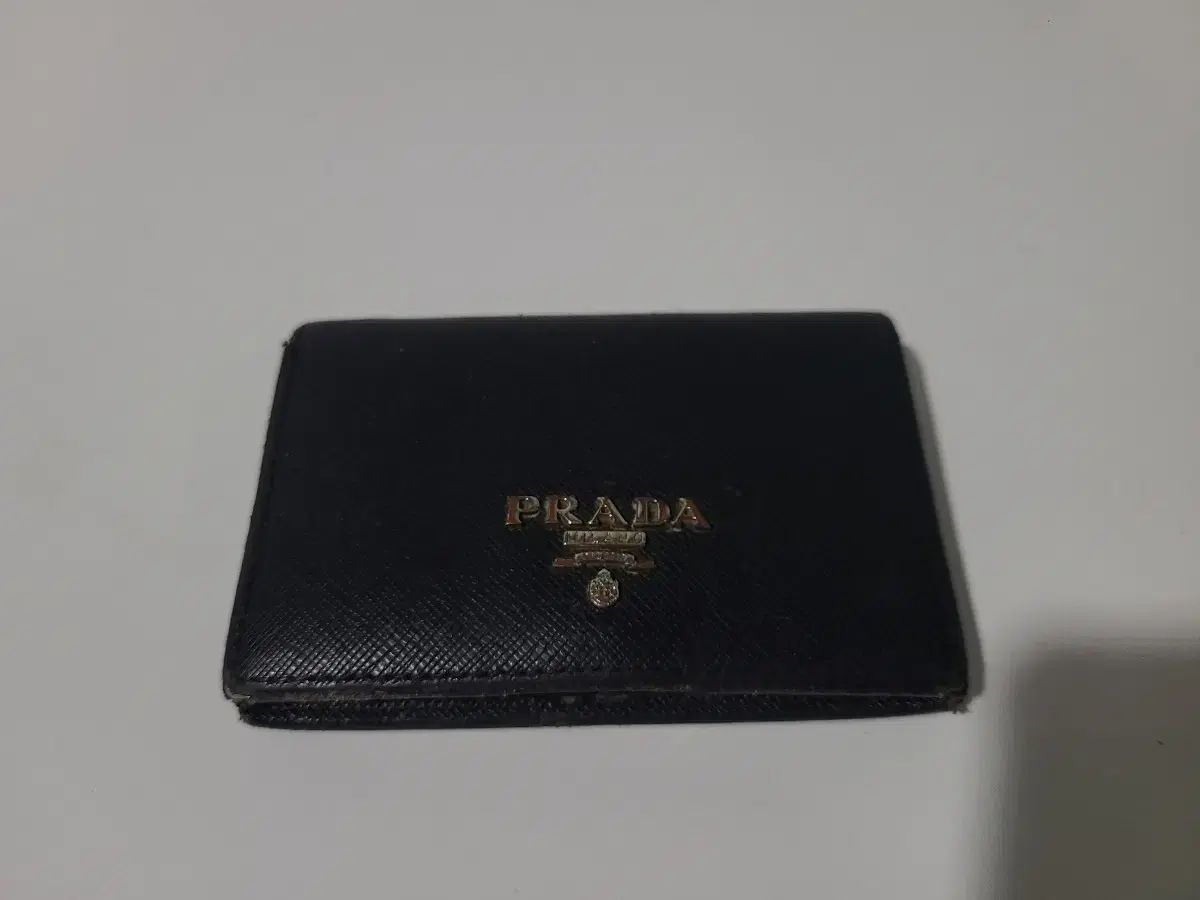 プラダ PRADA 二つ折り財布 TRIANGOLO 小銭入れ付き⁄SAFFIANO 中古 
