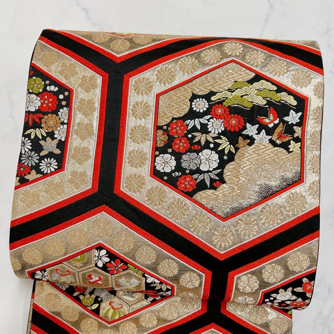 ハレの日に 宝尽くしと雪持ち松竹梅柄 唐織の袋帯 ハレの日に 宝尽くし